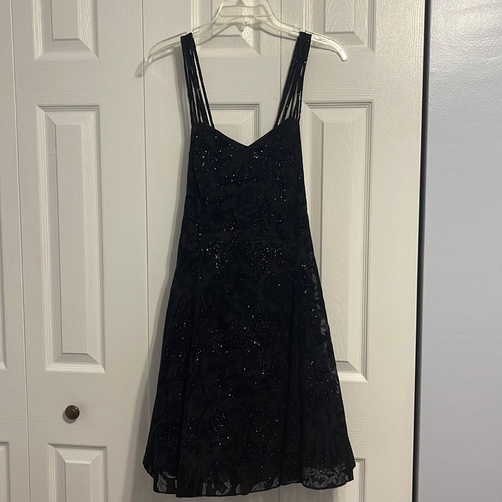 Black cross back dress with silver accents, size 13/14 (juniors)